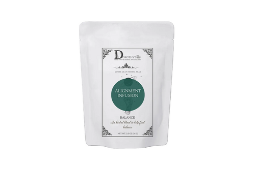 A package of Alignment Herbal Loose Leaf Infusion by Dorothy's, featuring an organic tea blend with ingredients like lavender, rose petals, and damiana.